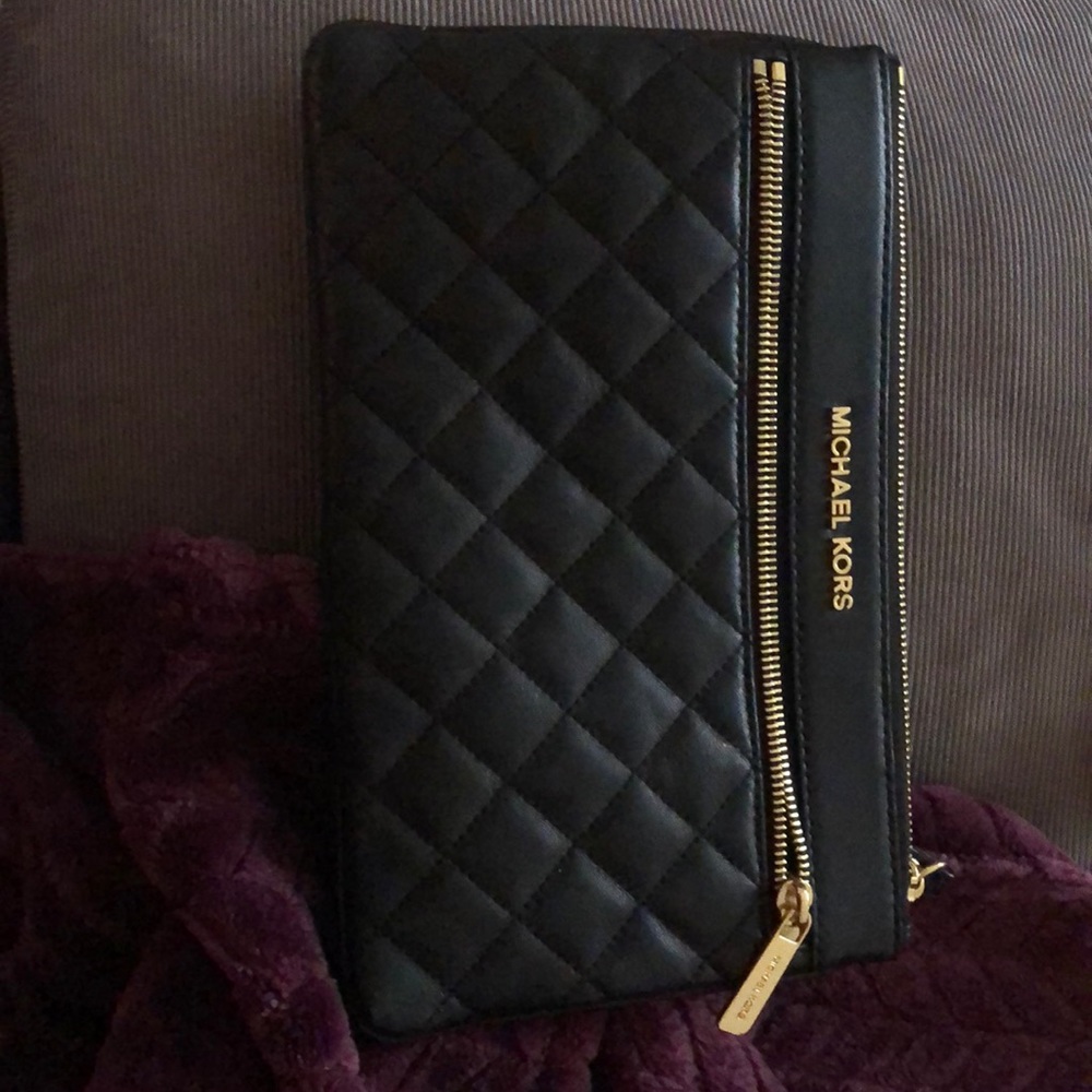 Gently used Michael lots clutch